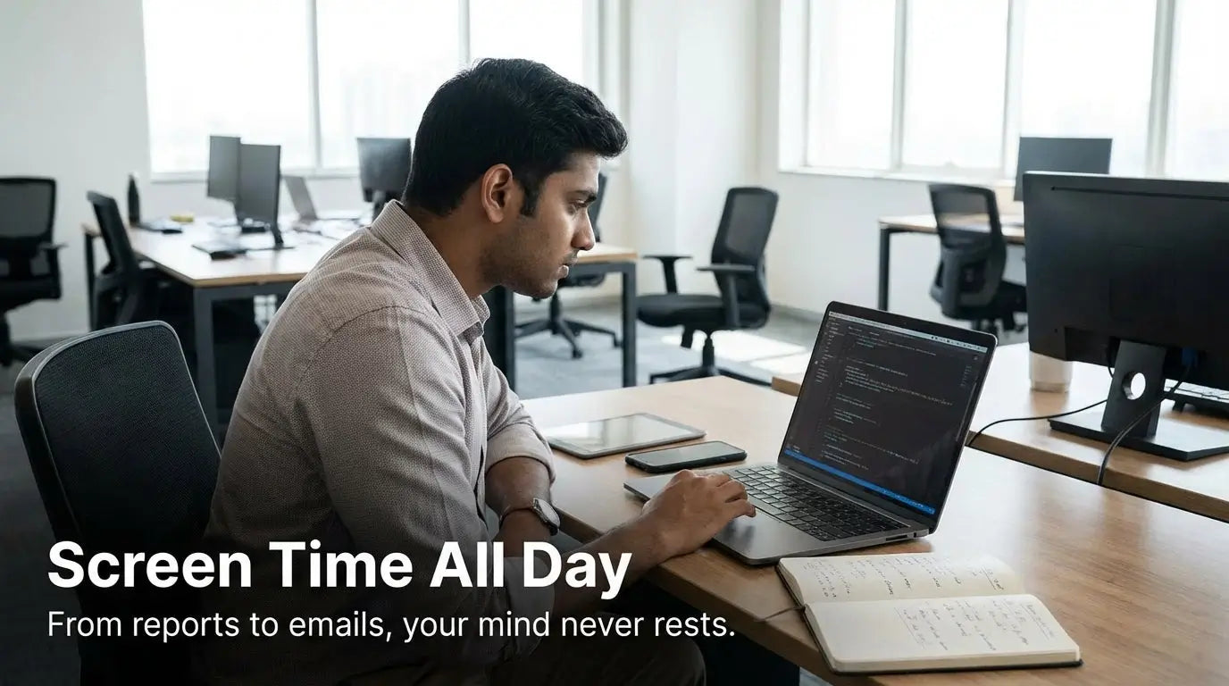 Software developer coding on laptop in office